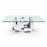 futuristic coffee table with geometric silver toned metal base and sleek glass top.