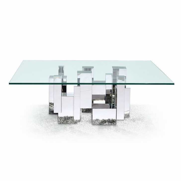 futuristic coffee table with geometric silver toned metal base and sleek glass top.